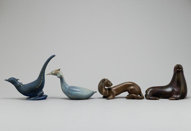 GUNNAR NYLUND, four stoneware figurines, from Rörstrand.