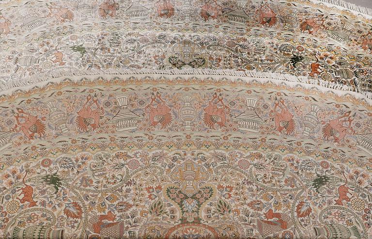 An oval pictoral silk carpet, ca 273 x 180 cm.