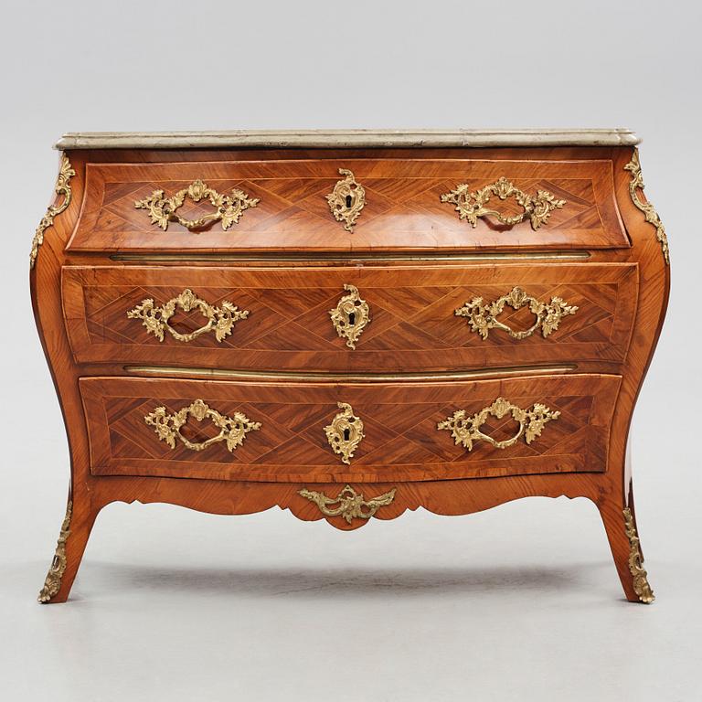 A Swedish rococo rosewood and gilt brass-mounted commode, later part of the 18th century.