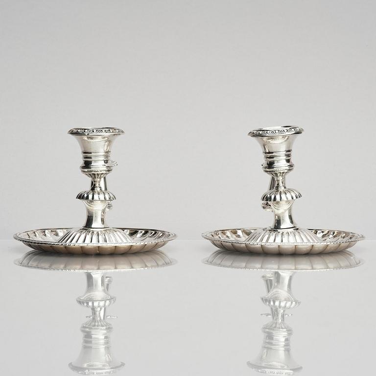 A pair of Swedish 19th century silver chamber-candlesticks, marks of Adolf Zethelius, Stockholm 1831.