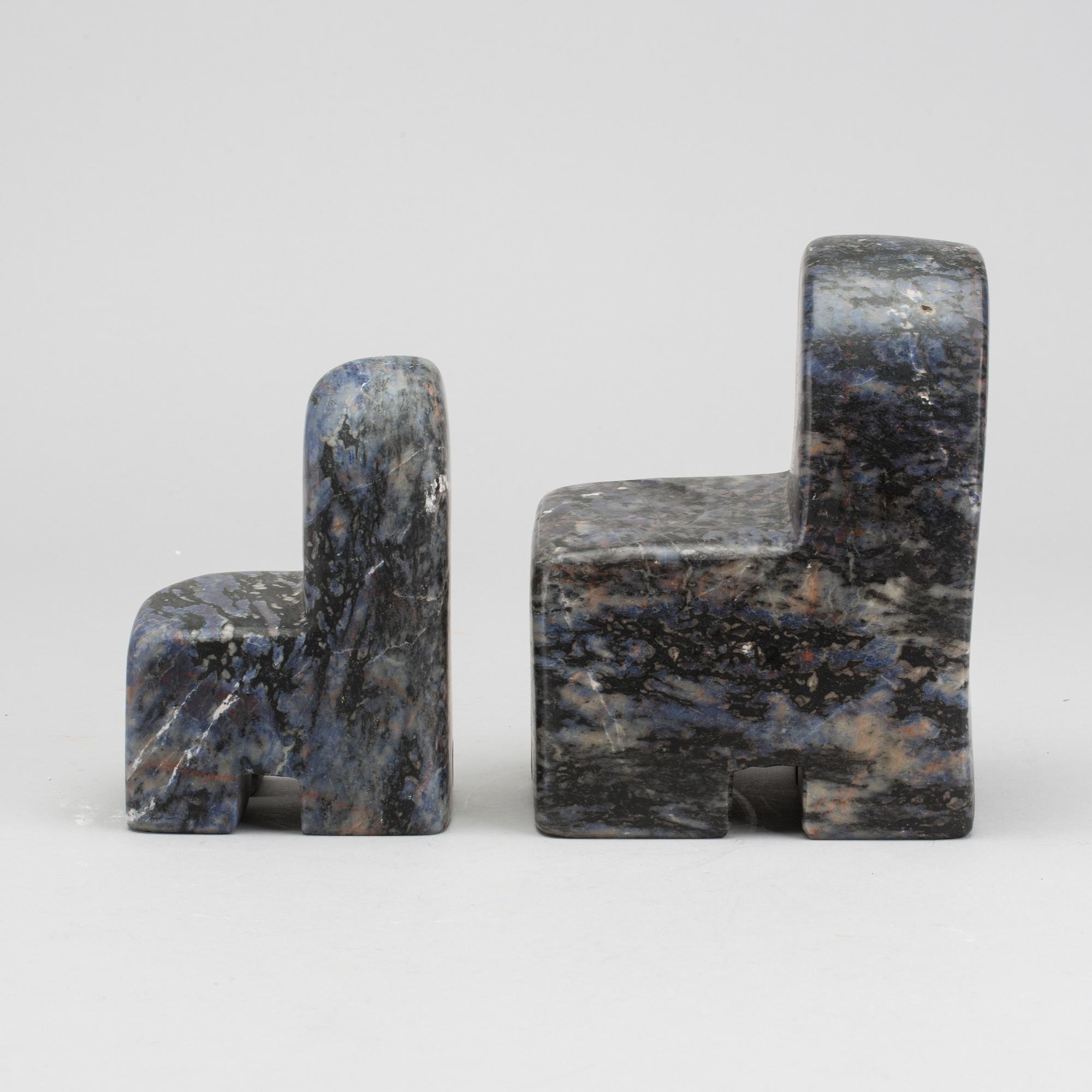 POUL ISBAK, a set of two signed and dated sculptures.