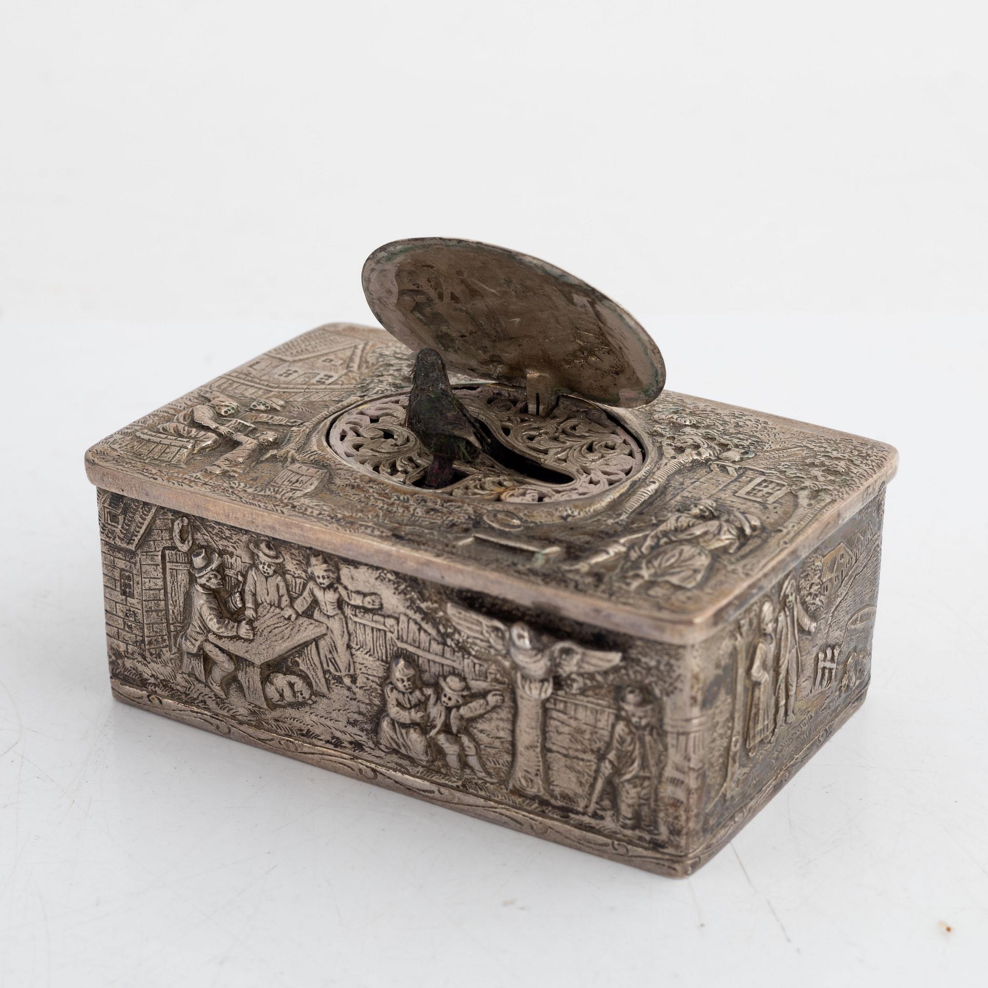 A German rococo style silver-plate music box, 19th century.