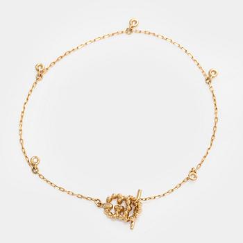 Gucci, armband, "Interlocking", 18K guld med briljantslipade diamanter.