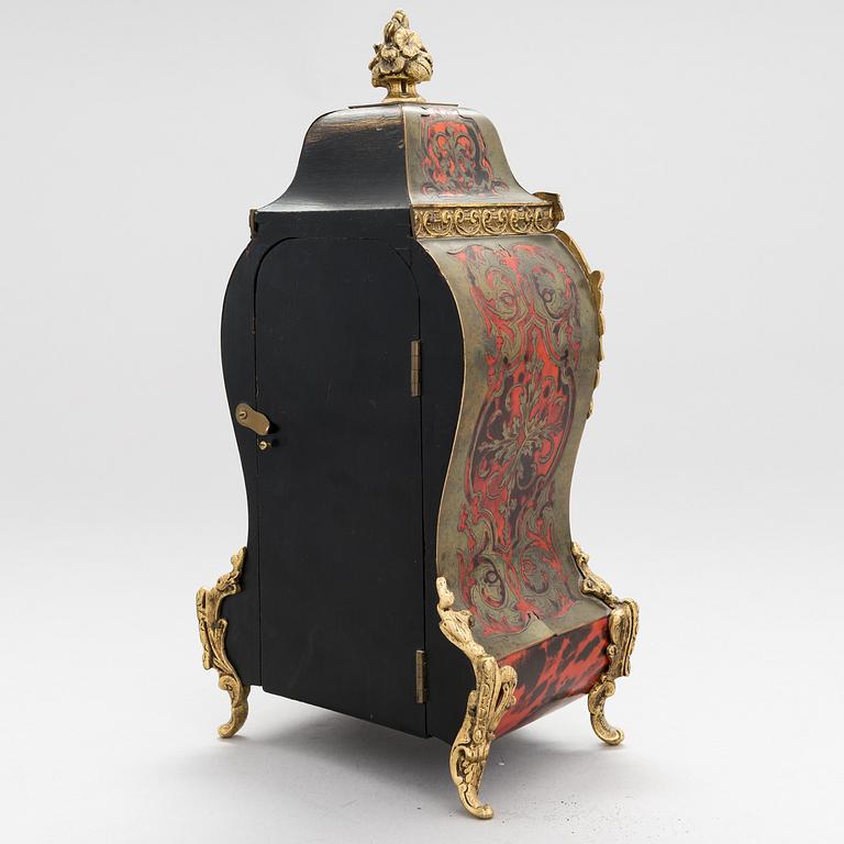 A French boulle style mantel clock, late 19th Century.