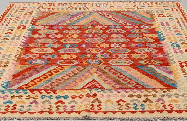 A CARPET, kilim, around 299 x 253 cm.