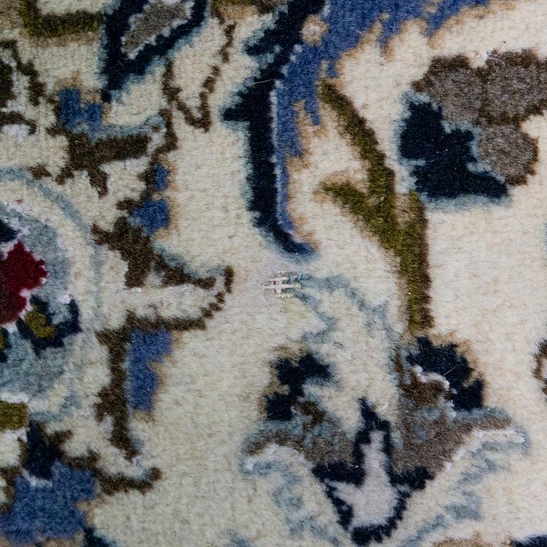 A CARPET, Nain, part silk, around 340 x 241 cm.