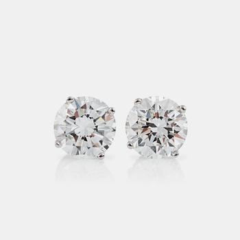 1288. A pair of brilliant-cut diamond, circa 1.65ct / 1.73ct, F-G/VS, earrings.