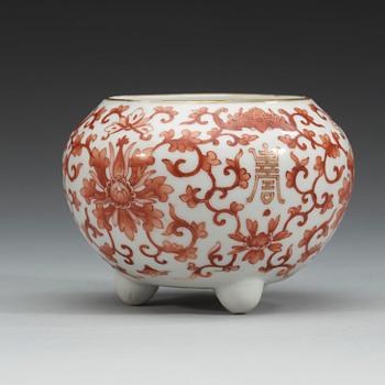 A red lotus tripod brush washer, Qing dynasty, 19th Century.