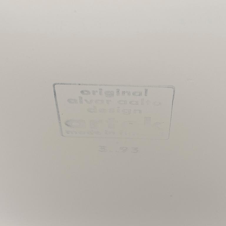 An occational table model 915 by Alvar Aalto for Artek.