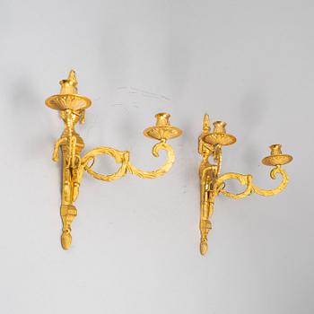 A 20th Century pair of Louis XVI style wall sconces.