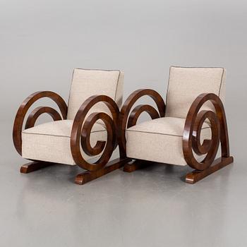 A pair of Art Deco armchairs.