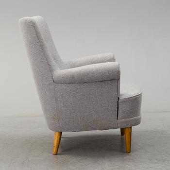 A 'Hemmakväll' easy chair by Carl Malmsten, late 20th century.