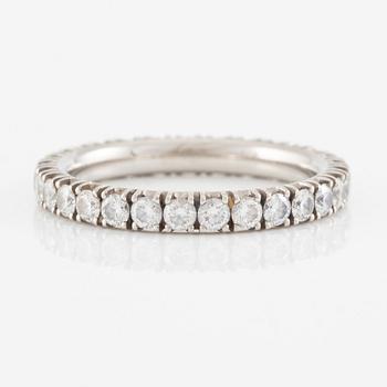Cartier eternity ring in platinum with round brilliant-cut diamonds.