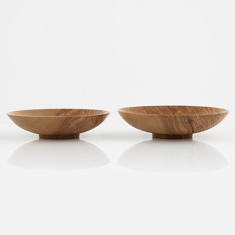 Magnus Ek, a set of eight ash wood plates for Oaxen Krog, 2021.
