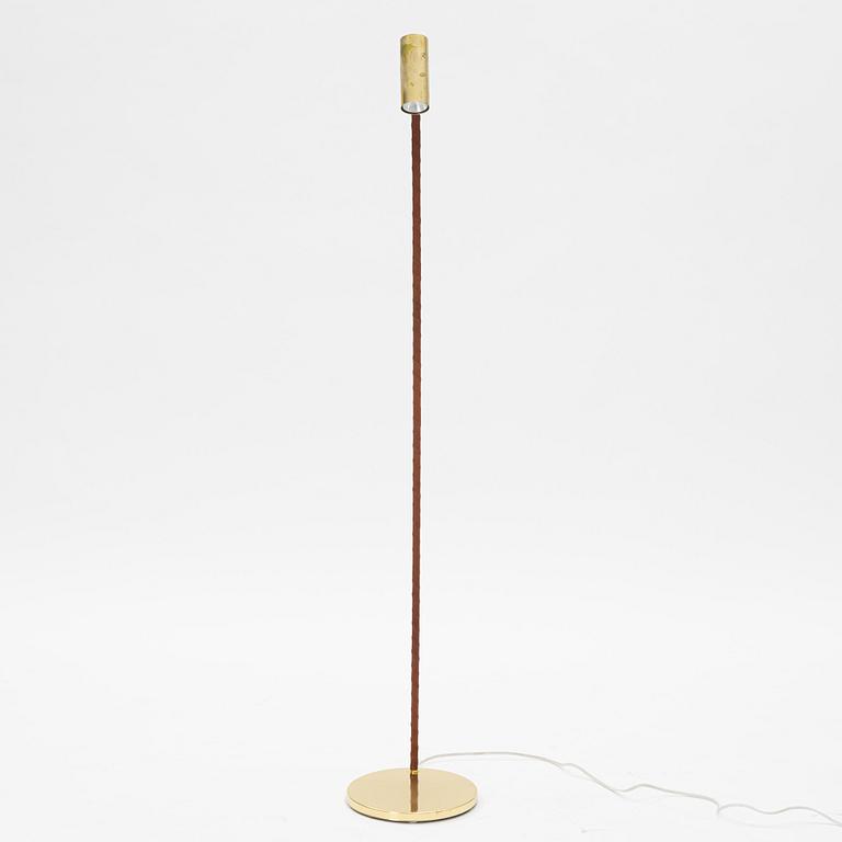 A brass floor lamp from Örsjö.