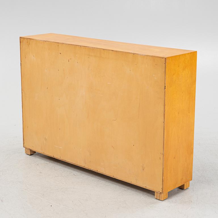 A birch veneered chest of drawers, 1930's.