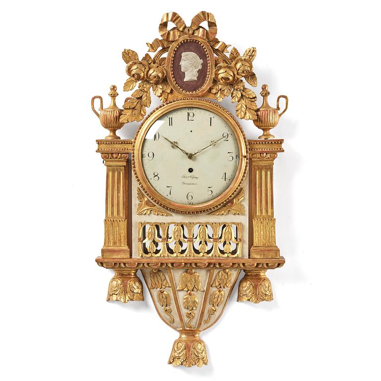 A late Gustavian giltwood cartel clock by J. Nyberg (master in Stockholm 1787-1801).