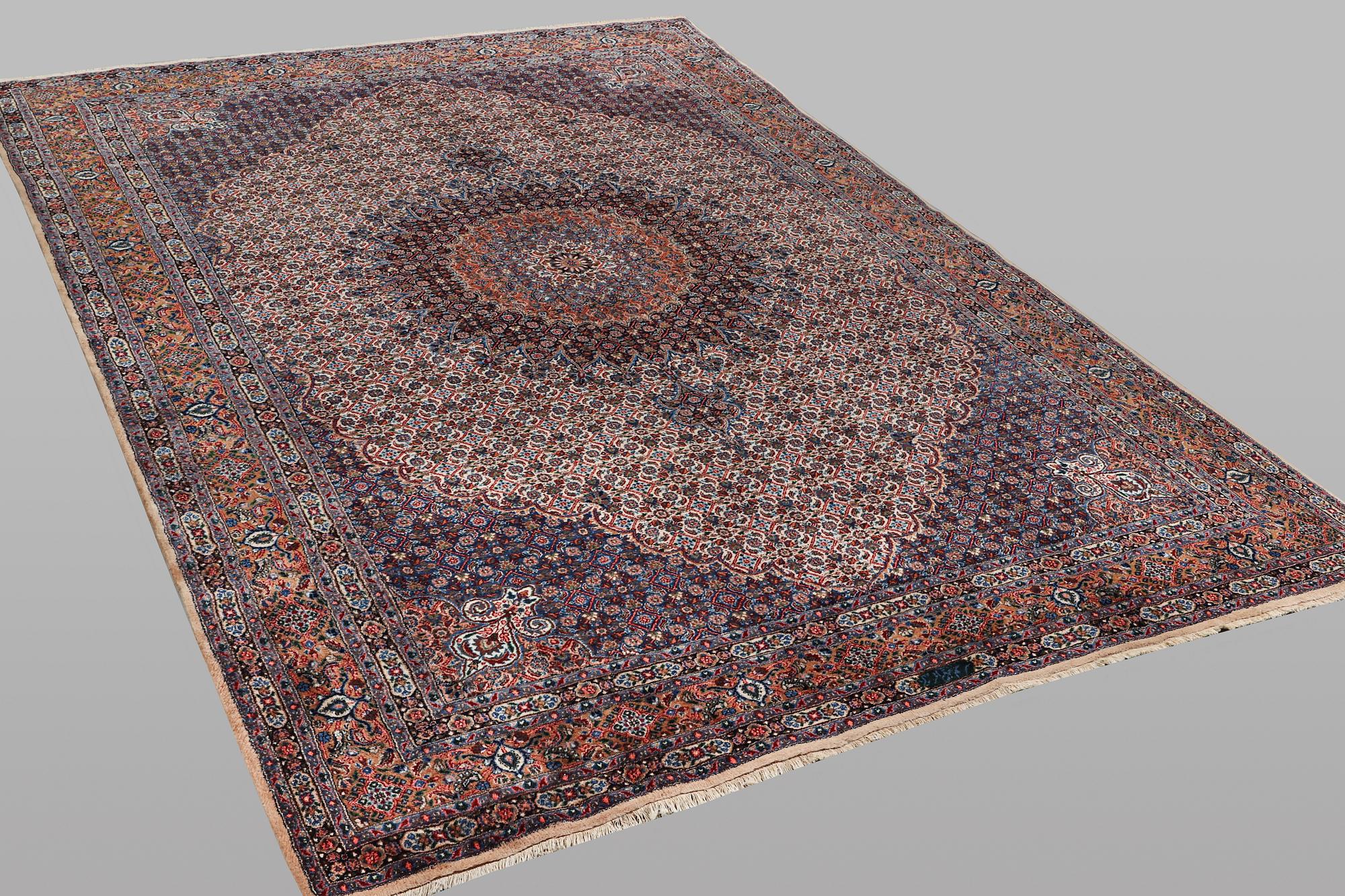 A carpet, Moud, signed, ca 385 x 268 cm.