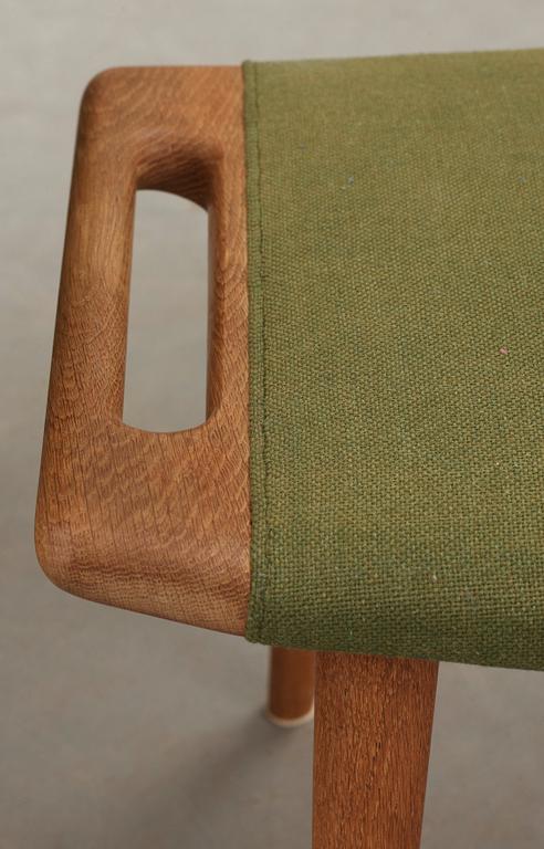 A Hans J Wegner 'Papa Bear' armchair and ottoman, AP-stolen, Denmark 1950's-60's.