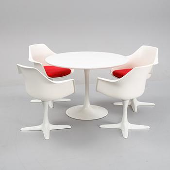 A dining set with a table and four chairs by Maurie Burke for Arkana, second half of the 20th Century.