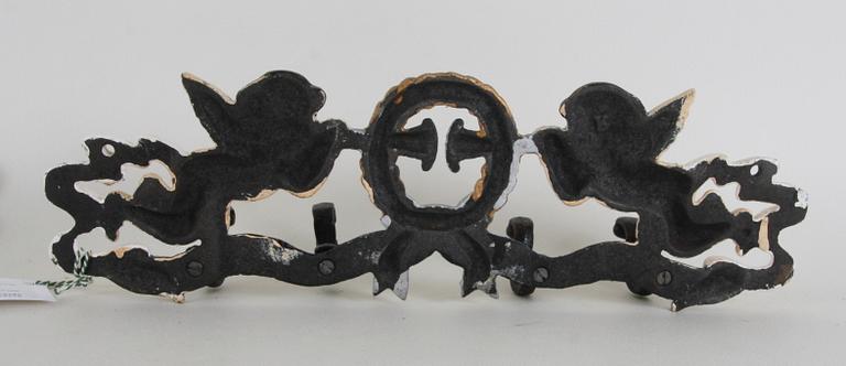 VÄGGHÄNGARE, ett par. Järn, 1900/2000-tal.