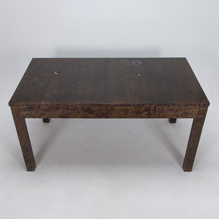 A Finnish 1930s dining table and eight chairs.