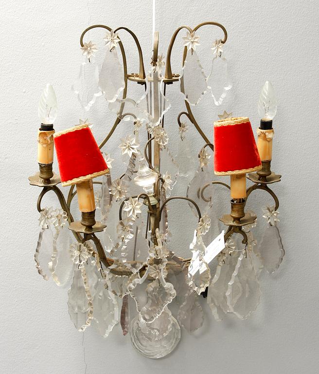 VÄGGLAMPETTER, ett par, rokokostil, 1800-tal.