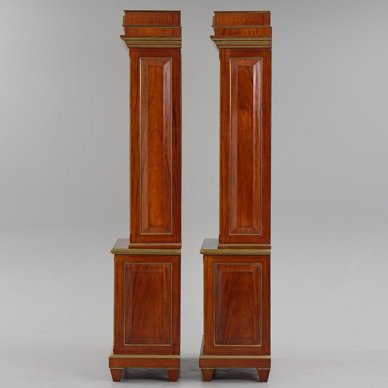 A pair of Russian mahogany and brass-mounted Jacob-style bibliothèques, modern with old parts.