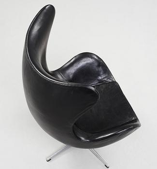 An Arne Jacobsen black leather 'Egg' chair, Fritz Hansen, Denmark 1960's.