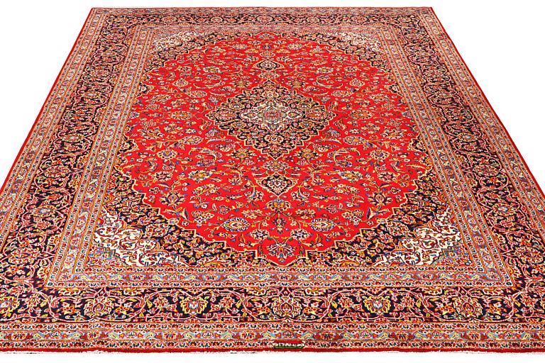 A Kashan carpet, c. 388 x 295 cm.
