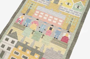 Edna Martin, a flat weave runner, c. 335 x 104 cm signed SH EM.