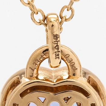 Kaulakoru, 18K kultaa, sydämen muotoinen fasettihiottu tanzaniitti ja briljanttihiottuja timantteja.