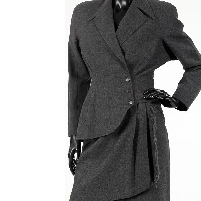 THIERRY MUGLER, a two-piece suit consisting of jacket and skirt.