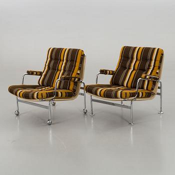 BRUNO MATHSSON, a pair of 'Karin' fabric upholstered easy chairs.