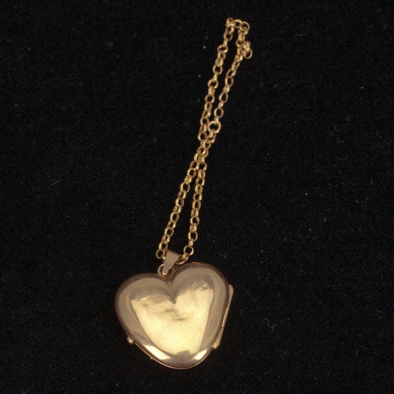 MEDALJONG, guld 18K, 1800-tal. Vikt ca 3,7 g.