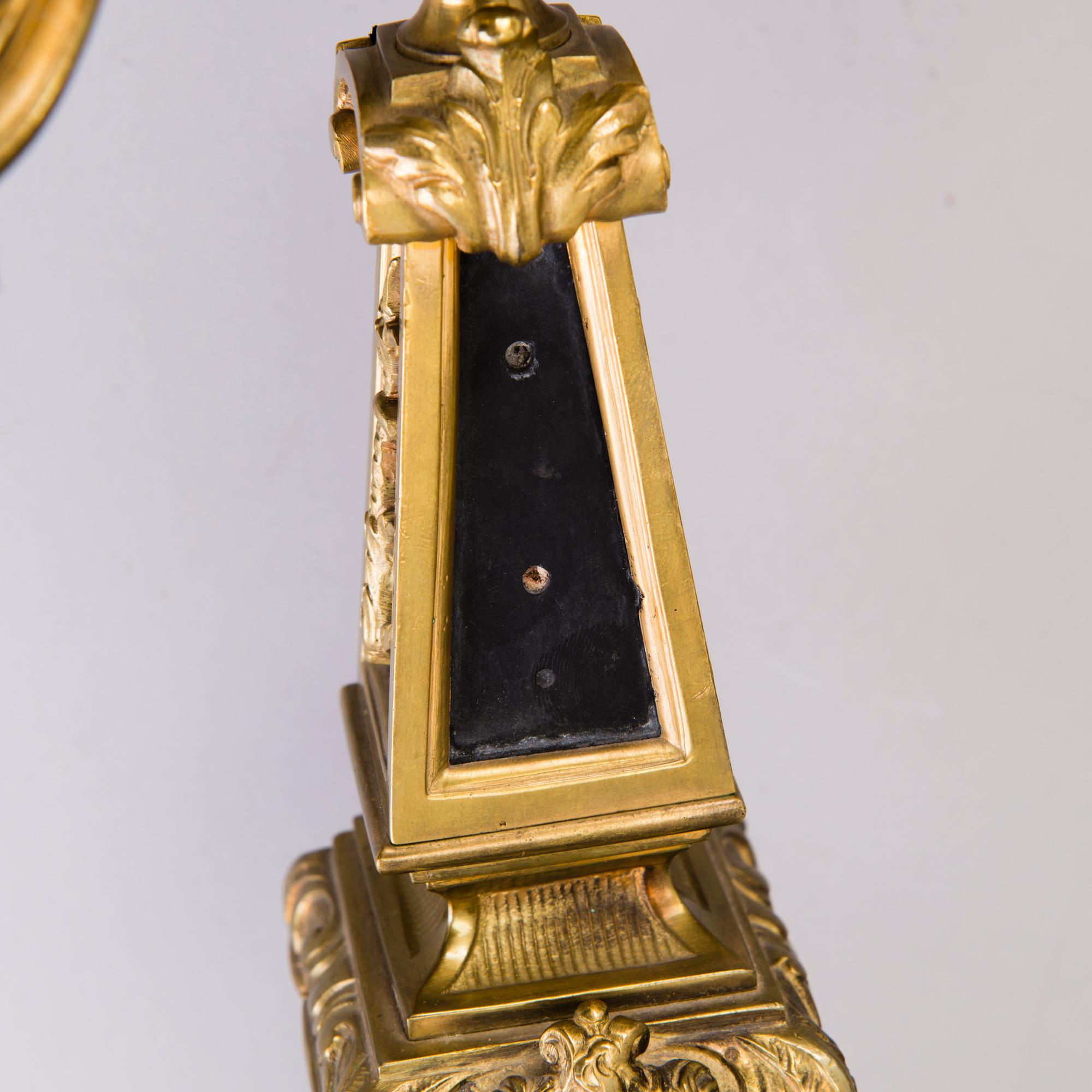A pair of bronze candelabra from the latter half of the 19th Century.