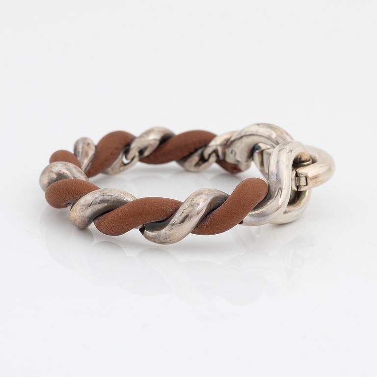 Hermès, a silver and leather bracelet, 2009.