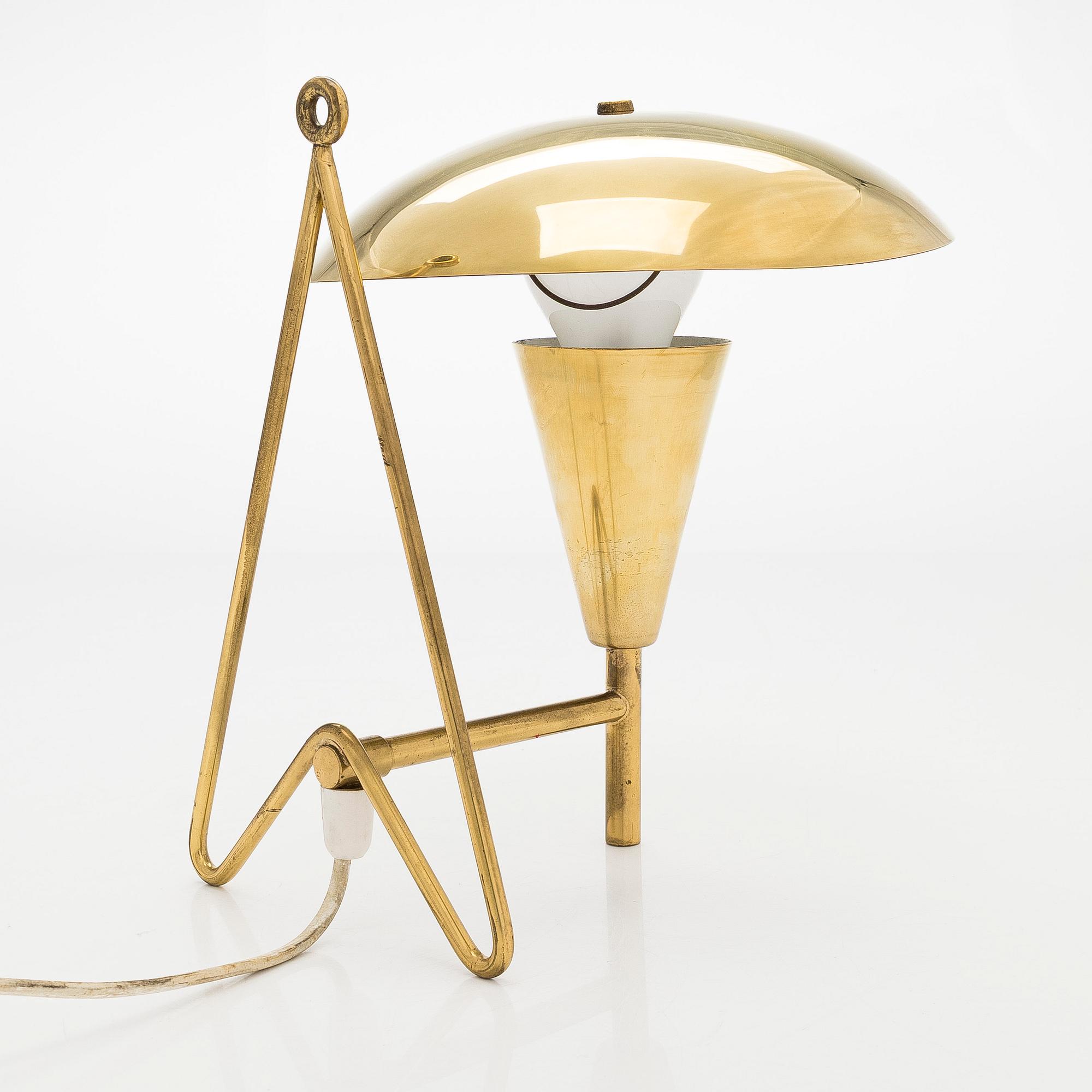 A mid-20th century model 'EV 57' wall / table lamp by Itsu.