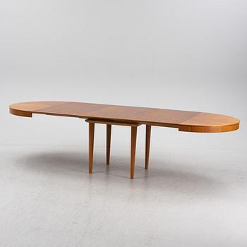 A mahogany veneered Swedish Modern dining table, 1950's.