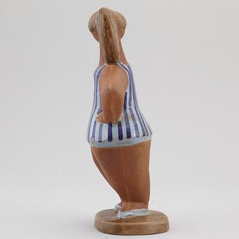 LISA LARSON, a 'Dora' stoneware figurine, from ABC-Flickorna, Gustavsberg.