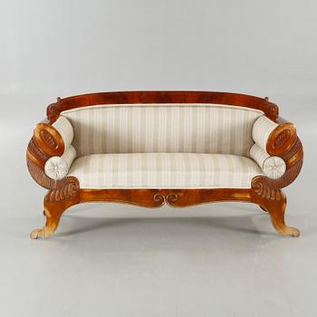 A late Empire sofa from the mid 19th century.