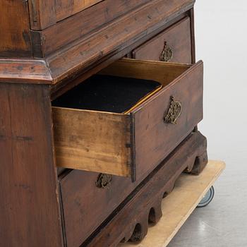 A 18th century vitrine cabinet.