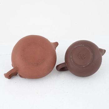 Two Yixing teapots, China, 20th century.