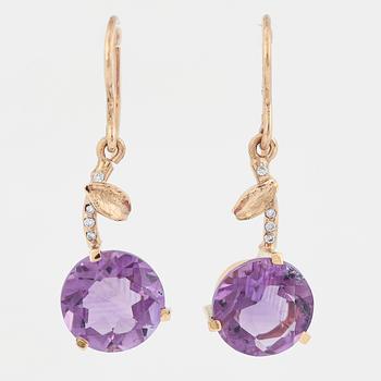 Round faceted amethyst and diamond earrings.