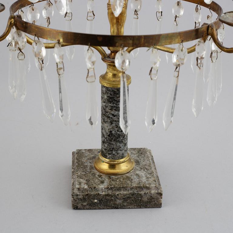 A gustavian style three-light girandole, first half of the 20th century.