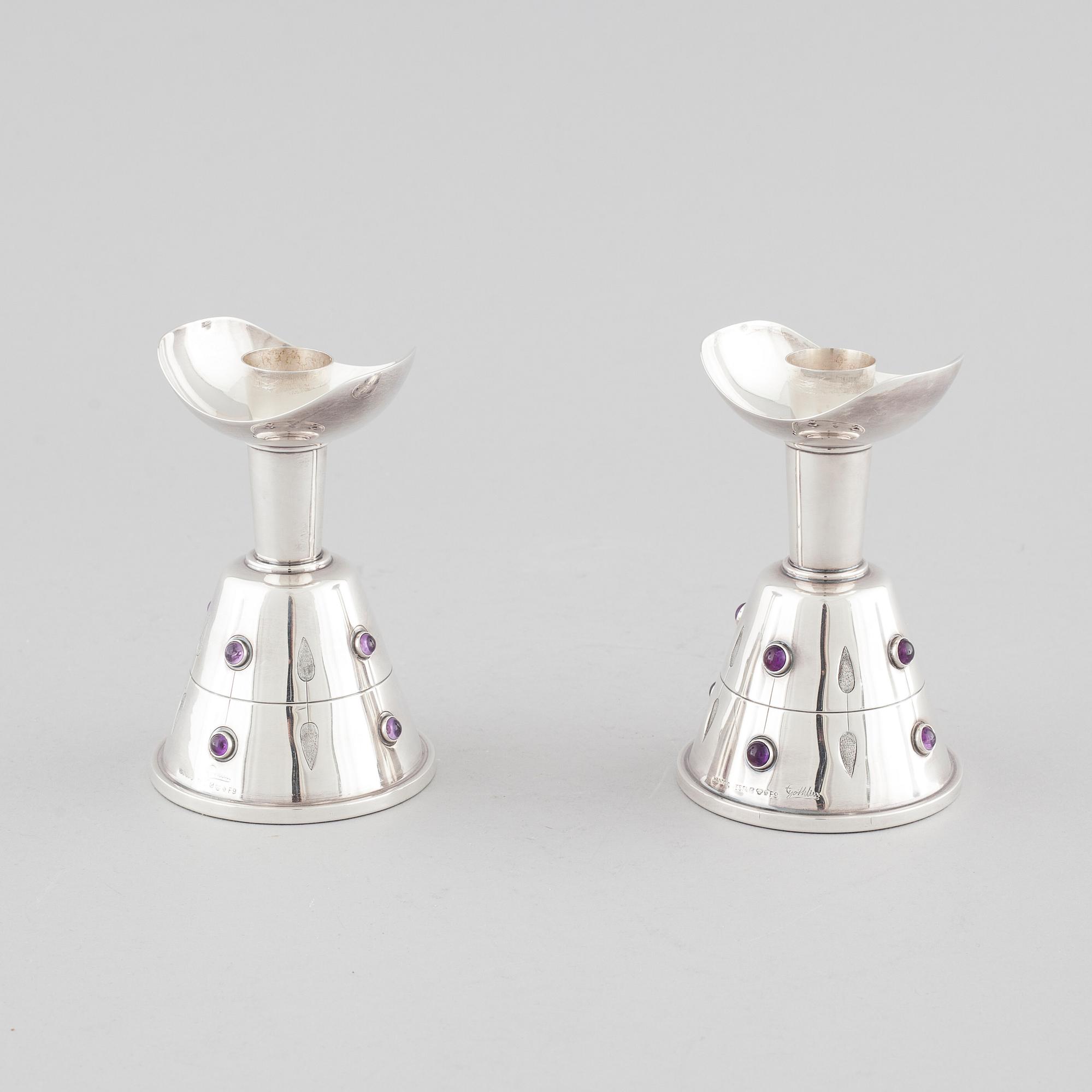 A pair of candleholders by Tage Göthlin in silver for Tesi, Gothenburg, year 1956. Weight in tot 580 gram.
