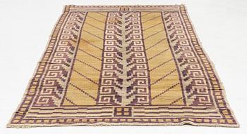 An Art Déco Pile Rug, 1930s. Circa 237 x 112 cm.