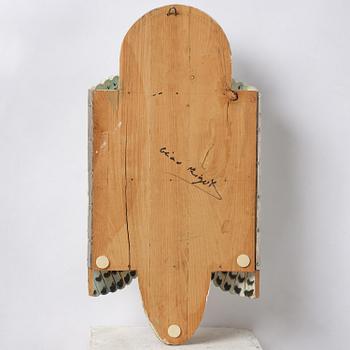 Gérard Rigot, a painted and carved oak wall cabinet, exectued in his studio, France, second half of the 20th century.