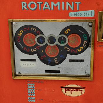 a mid 20th century Rotamint Record gambling machine.