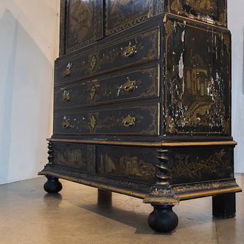 An early 18th century Chinese style cupboard.